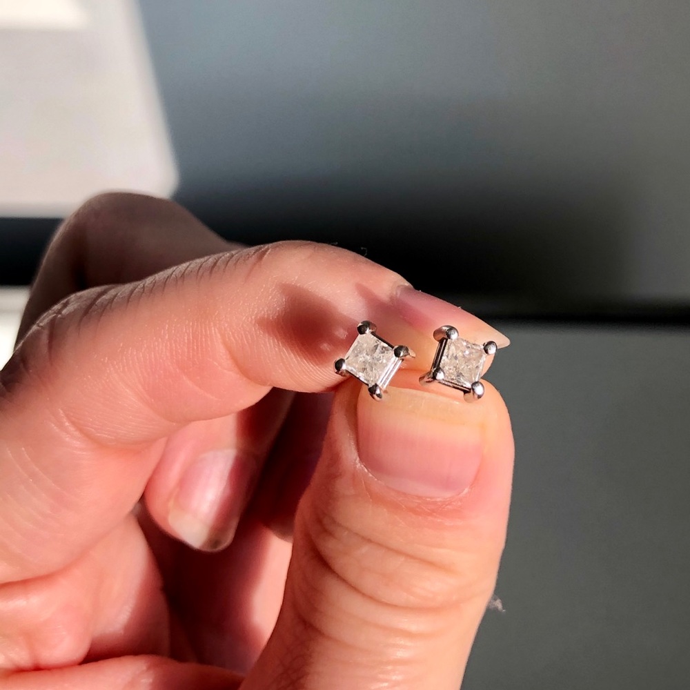 1/4 carat diamond studs set in 14k white gold.